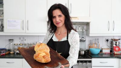 Elli Kriel preparing bread in the kitchen of her Dubai villa. Pawan Singh / The National