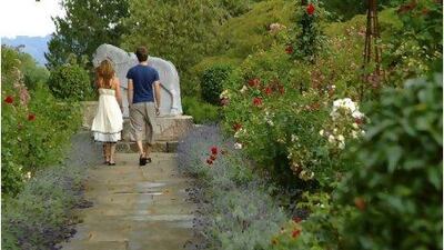 As part of Britain's National Gardens Scheme, owners temporarily open their private gardens to the public and the proceeds go to charity. Getty Images
