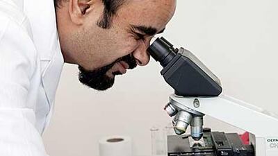 In one of the research laboratories at Dubai Pharmacy College, the associate professor Dr Aliasgar Shahiwala studies the shape and size of nano-particles.