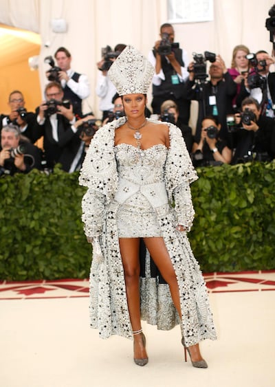 Singer Rihanna dressed in Maison Margiela for the Metropolitan Museum of Art Costume Institute Gala with the theme “Heavenly Bodies: Fashion and the Catholic Imagination”. Getty Images