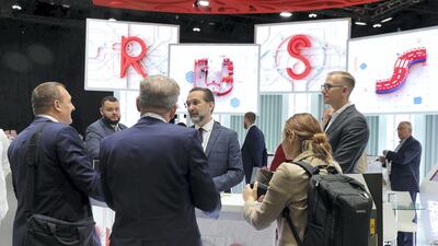 Delegates at the Russia stand welcome visitors. Pawan Singh / The National
