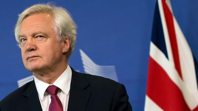 Brexit minister David Davis listens to opening remarks during his arrival at EU headquarters in Brussels. AP / Virginia Mayo