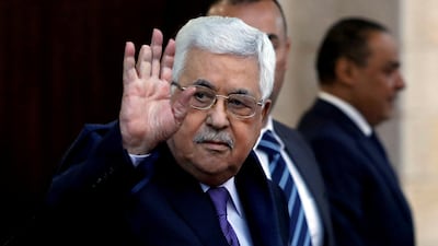 Palestinian President Mahmoud Abbas waves in Ramallah, in the occupied West Bank May 1, 2018. (Reuters/Mohamad Torokman, File)