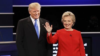 Republican presidential nominee Donald Trump and Democratic presidential nominee Hillary Clinton are introduced during the presidential debate at Hofstra University (AP Photo/David Goldman)