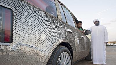 More than 60,000 coins adorn this luxury SUV, collected by the brothers Ali and Ahmed Al Showaihi in every GCC country. Jeff Topping / For The National