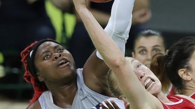 France’s Isabelle Yacoubou (4) fights for rebound with Serbia’s Danielle Page, right, during the bronze medal basketball game at the 2016 Summer Olympics in Rio de Janeiro, Brazil, Saturday, August 20, 2016. Charlie Neibergall / AP Photo