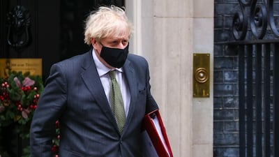 Boris Johnson departs from number 10 Downing Street on Wednesday morning. Bloomberg