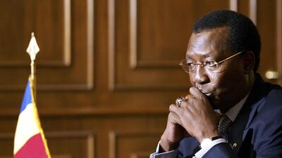 (FILES) In this file photo taken on June 30, 2004 Chadian President Idriss Deby answers to reporters in his palace of Njamena. Chad's President Idriss Deby Itno died on April 20, 2021 from wounds sustained in battle after three decades in power, the army announced. / AFP / Thomas COEX