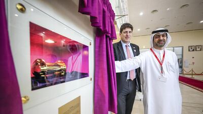 Patrick Moody, Britain's ambassador to the UAE, and school governor Younis Haji Al Khoori attend the time capsule ceremony. Victor Besa/The National