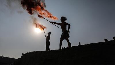 A fire-breathing performance in Gaza. Photo by Majd Mahmoud