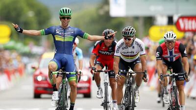 Australian rider Michael Matthews, left, of the Orica BikeExchange team celebrates after winning the 10th stage of the 103rd edition of the Tour de France. Yoan Valat / EPA