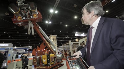 Folmer Kamminga, Geoborn’s managing director, demonstrates the use of the “Knight Hawk” drone with a remote control. Jaime Puebla / The National
