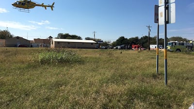 A helicopter flies near the site of a mass shooting in Sutherland Springs, Texas, U.S., November 5, 2017, in this picture obtained via social media. MAX MASSEY/ KSAT 12/via REUTERS THIS IMAGE HAS BEEN SUPPLIED BY A THIRD PARTY. MANDATORY CREDIT.NO RESALES. NO ARCHIVES