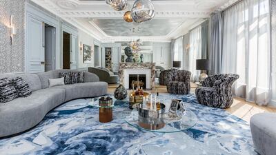 The main lounge features grey and blue interiors and mirrored walls to to bring to mind the vastness of the sky