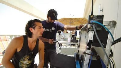 Director Ali Mostafa, above, on the set of City of Life, feels the film industry in the Middle East is blossoming.