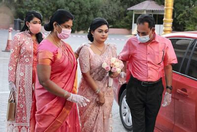 Weddings with 100 guests can now go ahead in Dubai, but everyone must be vaccinated and wear a mask. Pawan Singh / The National