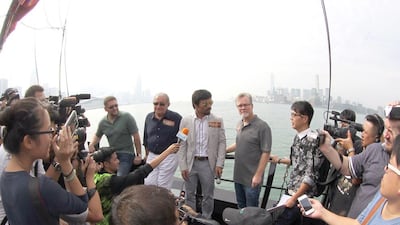 Manny Pacquiao, with trainer Freddie Roach and promoter Bob Arum tour Hong Kong last year as he promoted his November fight with Chris Algieri. Mike Young for The National / October 26, 2014