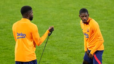 Barcelona's Ousmane Dembele, right, and Samuel Umtiti. AP Photo
