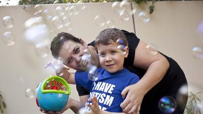 Ethan Van Vuuren, 6, at his home in The Springs with his mother Donna. Antonie Robertson / The National