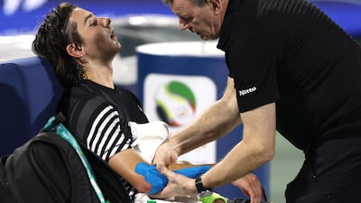 Kazakhstan's Alexander Shevchenko receives medical attention during his match against Daniil Medvedev. Reuters