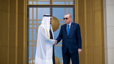 Sheikh Mohamed and Mr Erdogan stand for a photograph at the Presidential Complex
