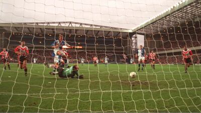 Blackburn's Alan Shearer scores on the rebound after Southampton goalkeeper Bruce Grobbelaar saved his penalty in 1994. Reuters