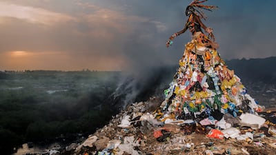 Located 30 kilometres from Dakar (Senegal), Mbeubeuss is an unauthorised dump site, where each day, 350 rubbish trucks dump about 1,300 tons of household waste, from Dakar and environs. It is an ecological bomb: since its creation in 1968, the dumpsite has been growing and increasingly gaining ground, polluting surrounding waters, soils and the environment. But Mbeubeuss is also a source of income for about 1,800 people who work in and earn their living from the dump site. Photo: Fabrice Monteiro / Prix Pictet