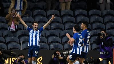 FC Porto's Fabio Vieira, left, celebrates after scoring against CD Santa Clara. AFP