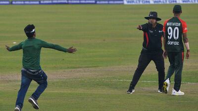A Bangladesh supporter runs on to the pitch at the Sher-e-Bangla National Cricket Stadium in Dhaka. AFP