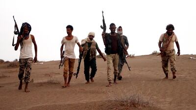 Yemeni government forces backed by the Arab coalition take position during military operations in Hodeidah, Yemen, on July 24, 2018. All photos by EPA