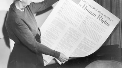 Eleanor Roosevelt with a copy of the UN's Universal Declaration of Human Rights. Getty Images
