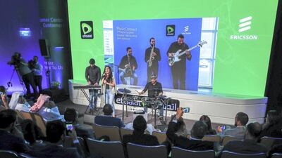 Two bands in different locations jam together in real time using 5G technology. All photos by Victor Besa / The National