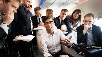Britain's Prime Minister Rishi Sunak holds a huddle with journalists on route to a G7 summit in Japan. AFP
