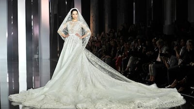 A model wearing the final dress walks the runway during the Ralph & Russo show as part of Paris Fashion Week - Haute Couture Fall/Winter 2014-2015 at Pavillon Cambon Capucines on July 10, 2014 in Paris, France. Kristy Sparow / Getty Images