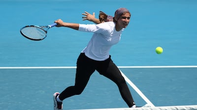 Meshkatolzahra Safi plays a backhand to Anja Nayar. Getty Images