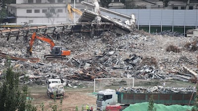 Goalposts are seen on the field (bottom C) during the demolition. AFP