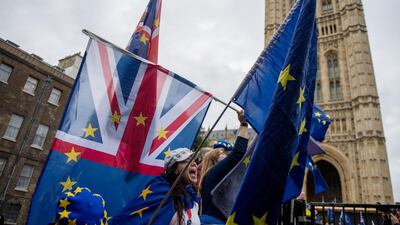 Anti-Brexit demonstrators gather outside the Houses of Parliament in London, England. Chris J Ratcliffe/ Getty Images