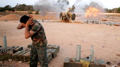 Libyan forces allied with the UN-backed government fire artillery towards ISIL fighters positions in Sirte, Libya, July 12, 2016. Much of the success against ISIL has been credited to local leaders rather than the new government in Tripoli. REUTERS/Goran Tomasevic