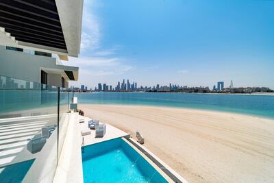 Views of Dubai Marina, and the property's infinity pool, from the top-floor terrace. Courtesy BlackBrick Property
