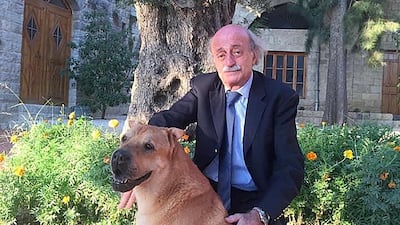 Walid Jumblatt with his favourite dog Oscar, which died earlier this year. Jumblatt, one of the most iconic figures in Lebanon's turbulent history, is at the centre of a political crisis pitting him against the far more powerful Hezbollah and which could determine his fate. The National