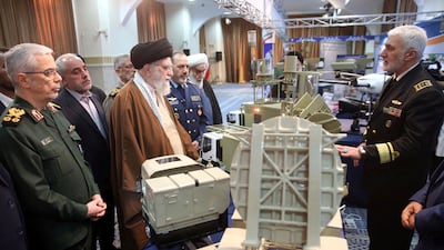 Ayatollah Ali Khamenei, Iran's supreme leader, visiting a defence exhibition in Tehran last month. His regime denies it is developing a nuclear weapon. Reuters