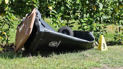 A police evidence marker next to a rubbish bin near the scene. AFP