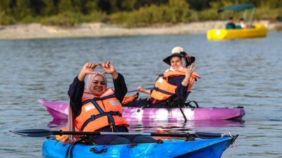 Visitors enjoy their afternoon out at the Anantara Eastern Mangroves in Abu Dhabi. Victor Besa / The National