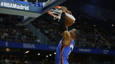 Oklahoma City Thunder guard Russell Westbrook dunks against Real Madrid. Daniel Ochoa de Olza / AP