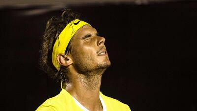 Rafael Nadal of Spain gestures during their men’s singles semi-final match against Pablo Cuevas of Uruguay at the 2016 Rio Open tennis tournament in Rio de Janeiro, Brazil, on February 20, 2016. AFP PHOTO / YASUYOSHI CHIBA
