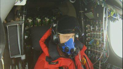 Pilot Andre Borschberg flying the Solar Impulse 2 which has just passed the halfway point of its Pacific Ocean crossing. Courtesy Solar Impulse