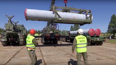 Military personnel prepare Russian air-defense missile systems during the military exercises in the Chita region, Eastern Siberia, during the Vostok 2018 exercises. AP