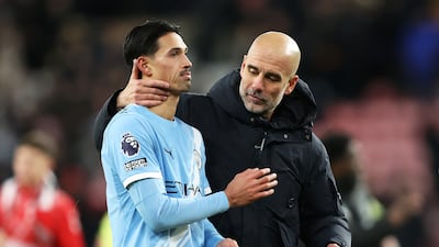 Manchester City manager Pep Guardiola, right, consoles Tijjani Reijnders after the Premier League draw with Sunderland. Getty Images