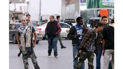 One reader returning to Libya finds that the machine gun is still the nation's arbiter of justice. (Mahmud Turkia / AFP)