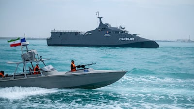 An IRGC warship and speed boat taking part in a parade in the Arabian Gulf in 2024. AFP